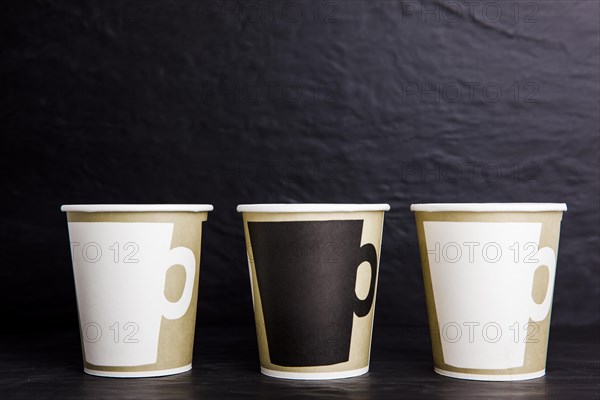 Mockup three coffee go cups