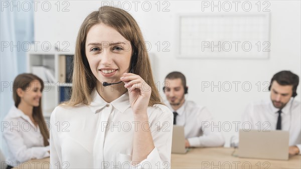 Portrait woman working call center