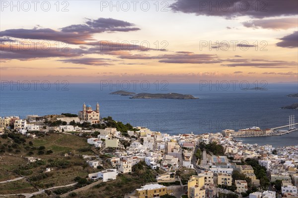 View of the town of Ermoupoli with Anastasi Church or Church of the Resurrection at sunset