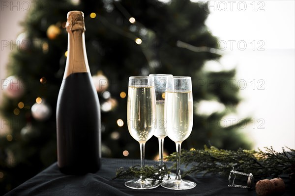 Champagne glasses with bottle