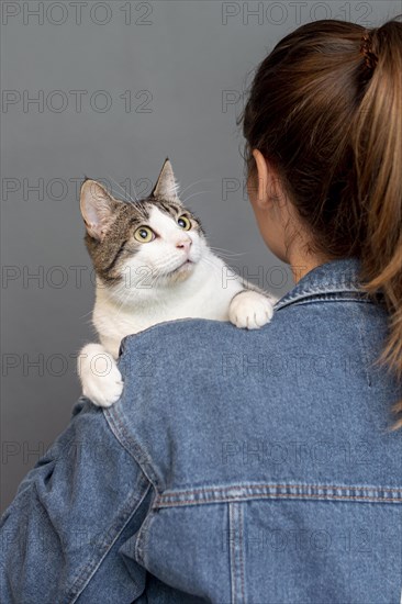 High angle woman holding cat