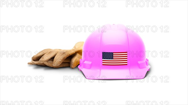Pink hardhat with an american flag decal on the front and gloves isolated on white background