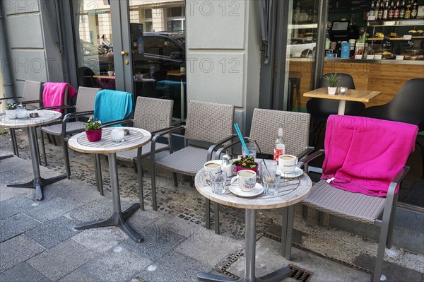 Bistro tables with colourful blankets