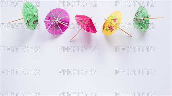 Bright cocktail umbrellas table