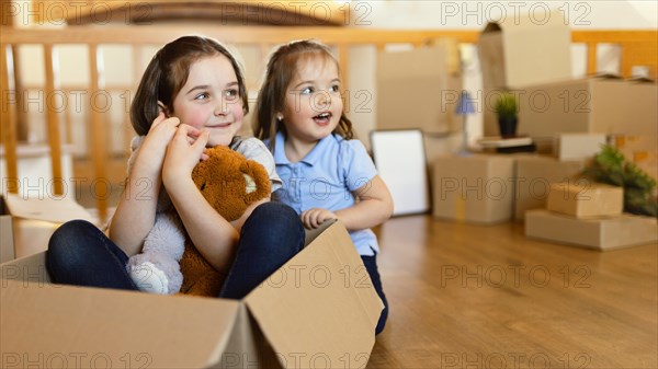 Smiley kids with box toys