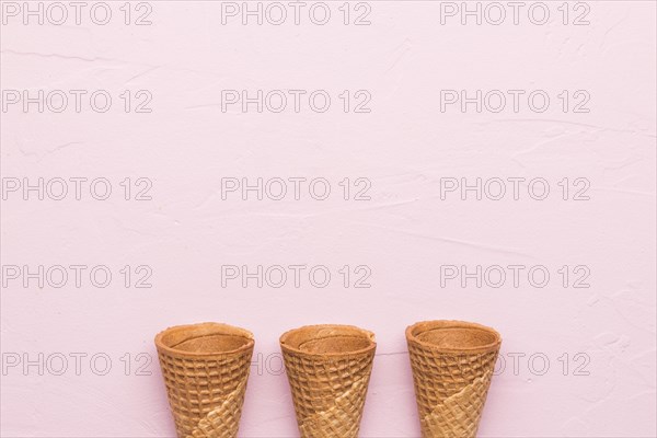Waffle cones pink background