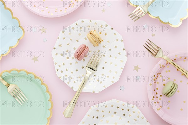 Flat lay plastic plates forks