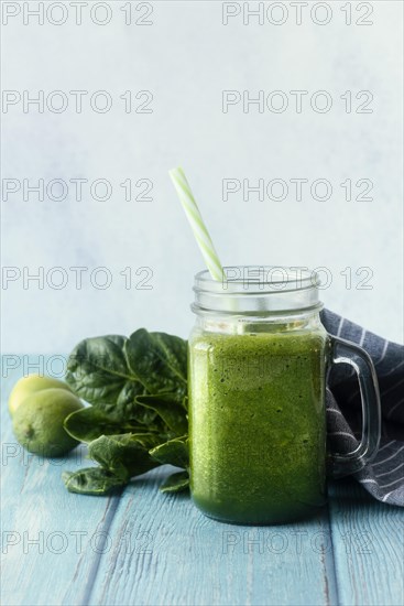 Green smoothie wooden table