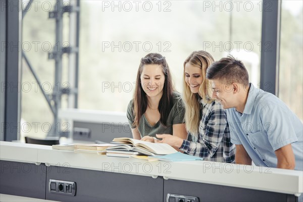 Cheerful readers table library