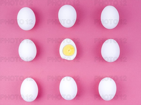 White chicken eggs with boiled egg table