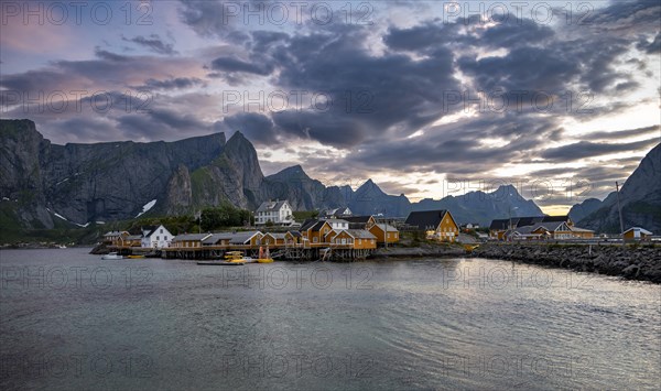 Traditional yellow rorbuer cabins on Sakrisoya Island