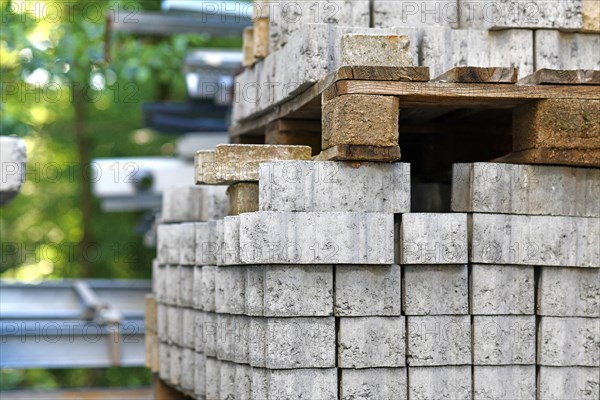 Cobble stones on palette at construction site