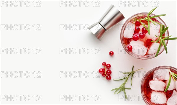 Top view cranberry vodka glasses with ice copy space