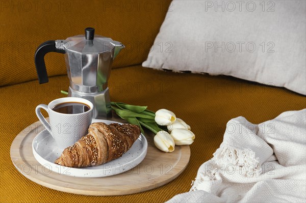 High angle croissant coffee flowers