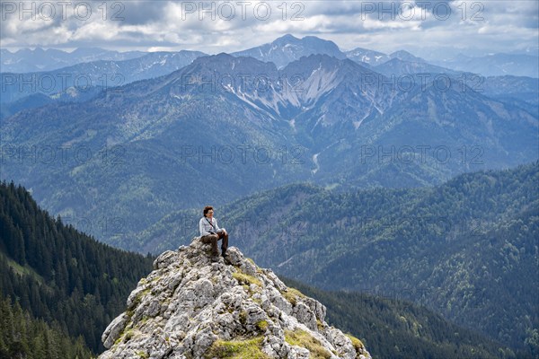 Mountaineer at the summit of Taubenstein