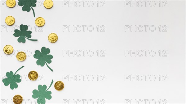 Flat lay coins clovers frame