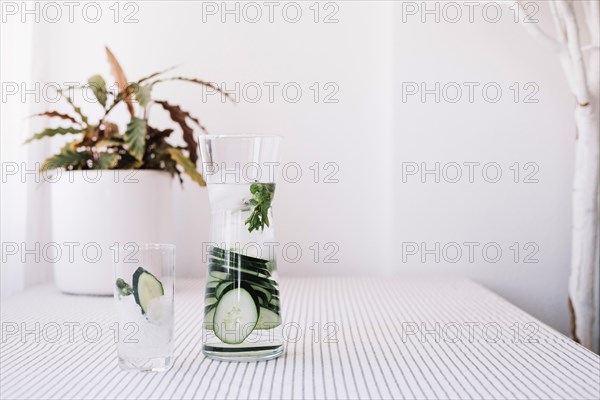 Glass jug with refreshing water