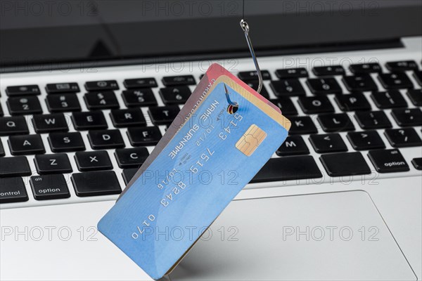 High angle credit card with hook phishing