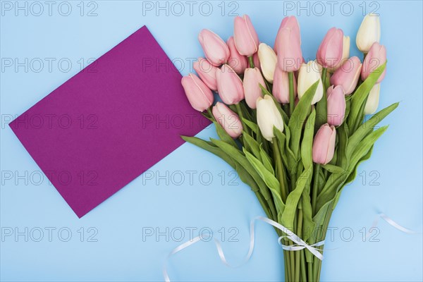 Bouquet tulips with purple card