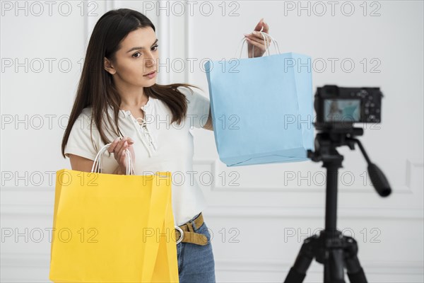 Young blogger recording video