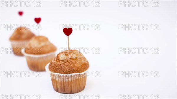 Cupcakes with small heart toppers
