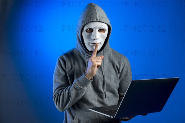 Portrait hacker with mask