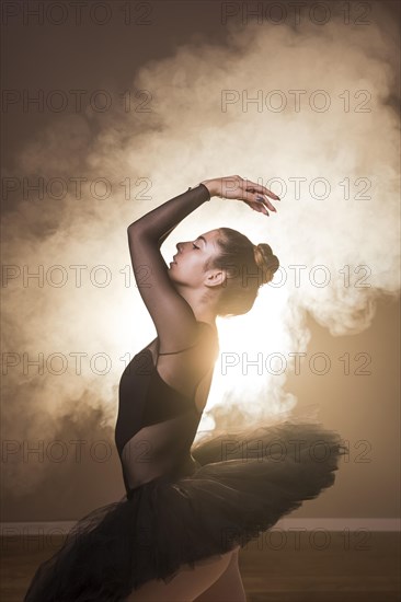 Side view ballet posture smoke