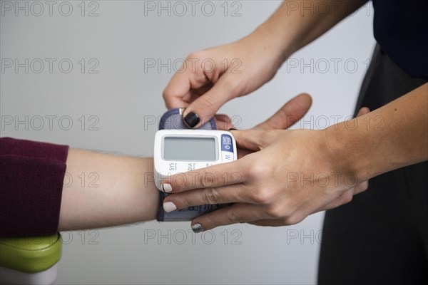 Close up measuring blood pressure device