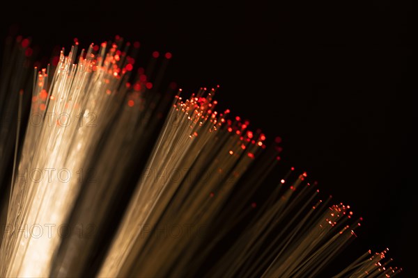 Close up optical fiber with red spots
