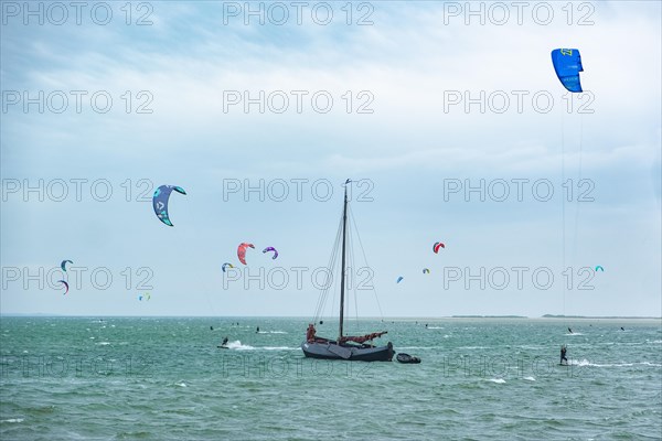 Kite surfers on the green beach of Terschelling