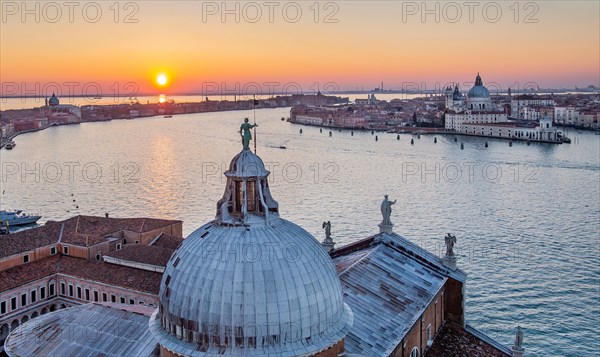 Sunset over the Giudecca Canal with the churches of San Giorgio Maggiore and Santa Maria della Salute