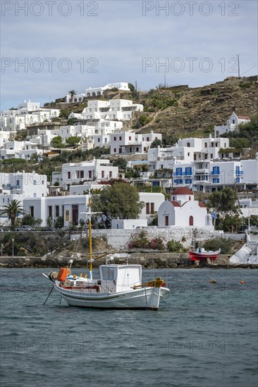 Old port of Mykonos with colourful fishing boat