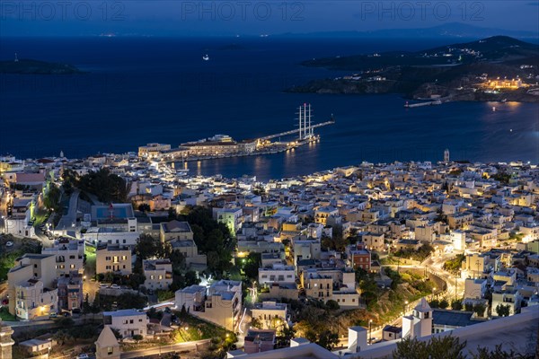 View of the illuminated town of Ermoupoli with harbour