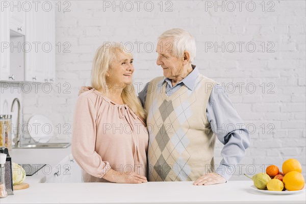 Senior couple together kitchen