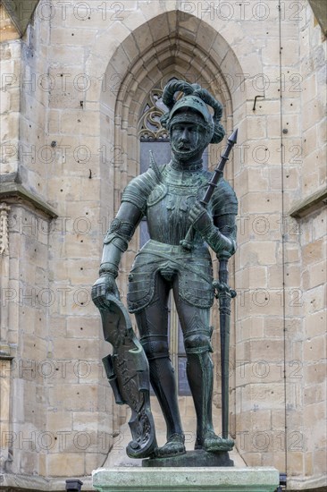 Bronze sculpture of the market fountain in front of the Protestant town church