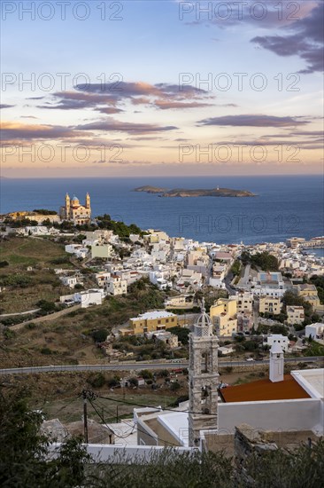 View of the town of Ermoupoli with Anastasi Church or Church of the Resurrection at sunset