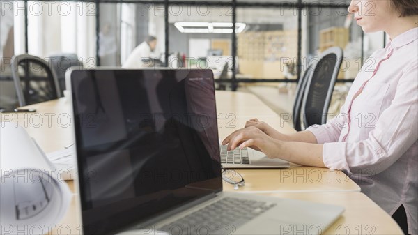 Businesswoman working with laptop office