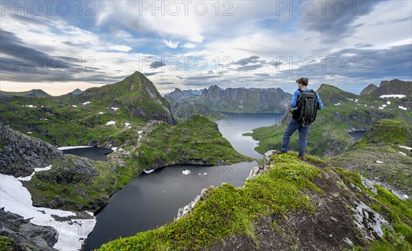 View over mountain landscape and lake Litlforsvatnet with fjord Forsfjorden