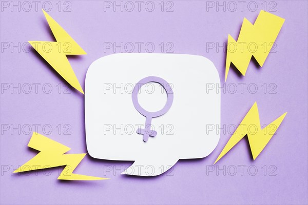 Feminine gender sign speech bubble surrounded by thunders