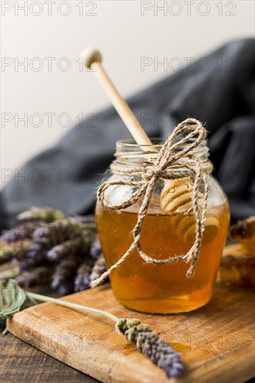 Honey jar with spoon lavender