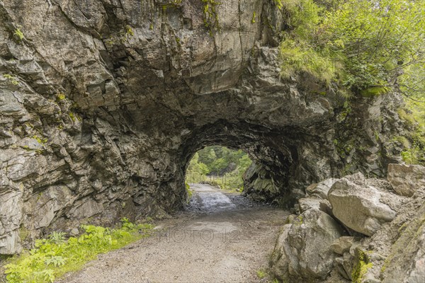 Small cave as a passage on the way to Nassfeld in the Gastein Valley