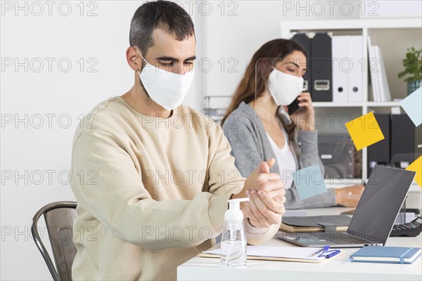 Medium shot people wearing face mask