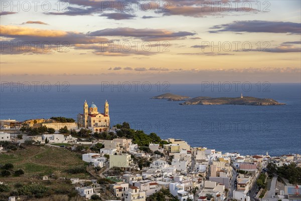 View of the town of Ermoupoli with Anastasi Church or Church of the Resurrection at sunset