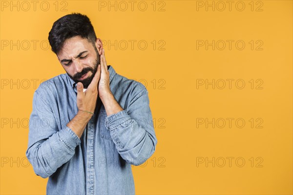 Medium shot guy with hands his chin