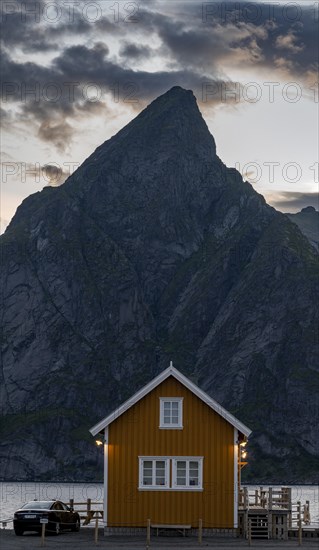 Yellow Rorbuer hut on Sakrisoya island