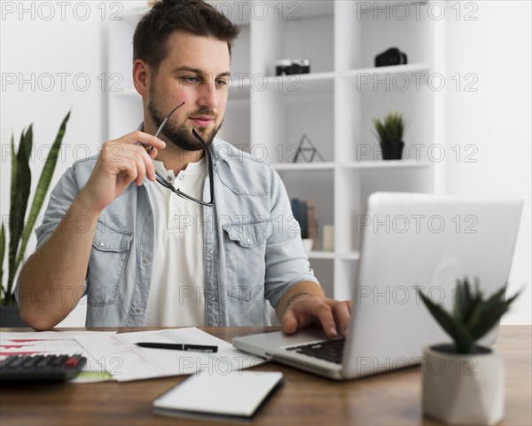 Portrait casual male working from home