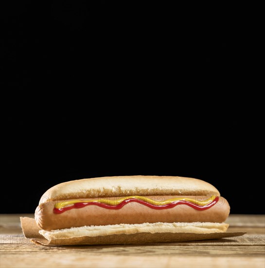 Front view hot dog black copy space background