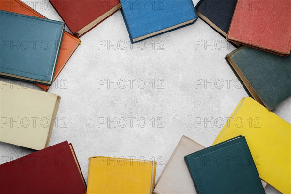 Top view books circle with copy space