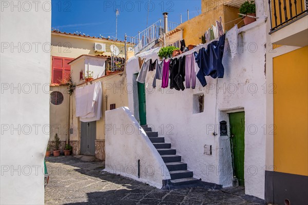 Old town house with hanging laundry