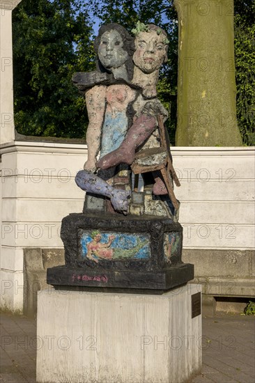 Sculpture Monument to Clara and Robert Schumann by Markus Luepertz in front of the columns of the classicist Ratinger Tor